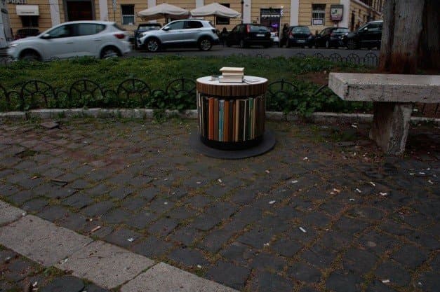 AI-generated concept of a round book-sharing structure in the piazza